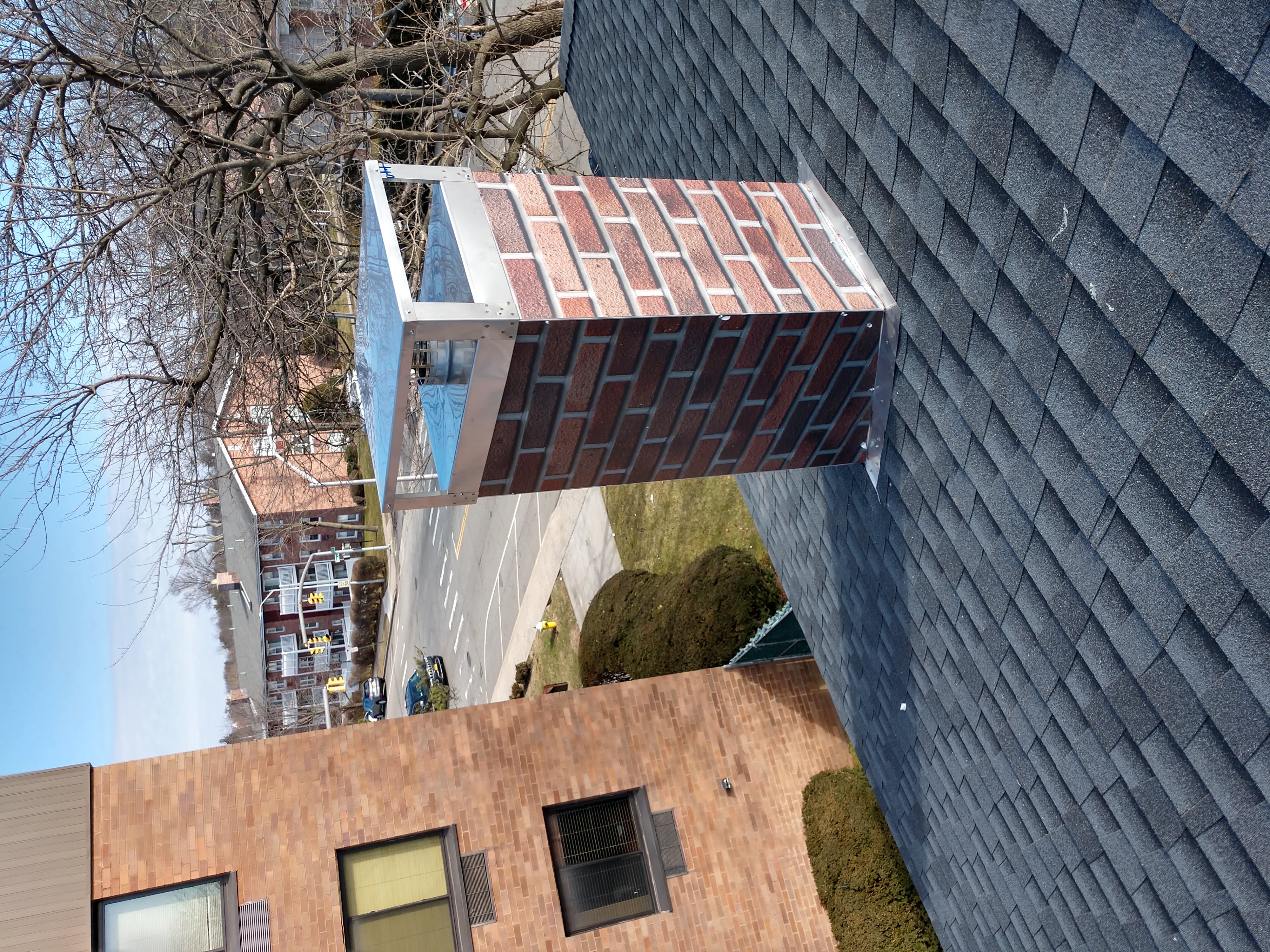 New elastomeric sealant applied to chimney crown in Sea Cliff, NY