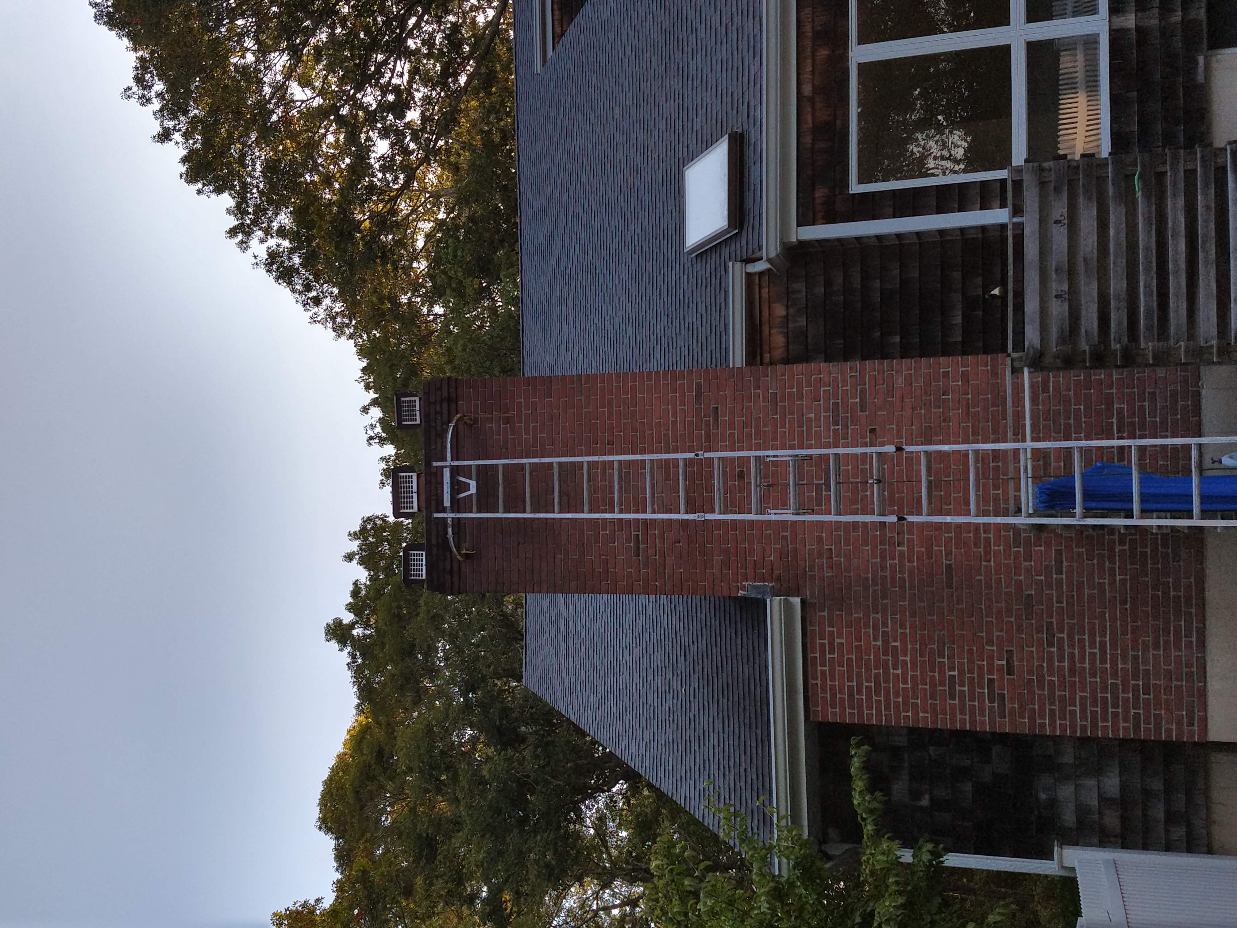 Draft-reducing chimney damper fixing heat loss in Sea Cliff, NY